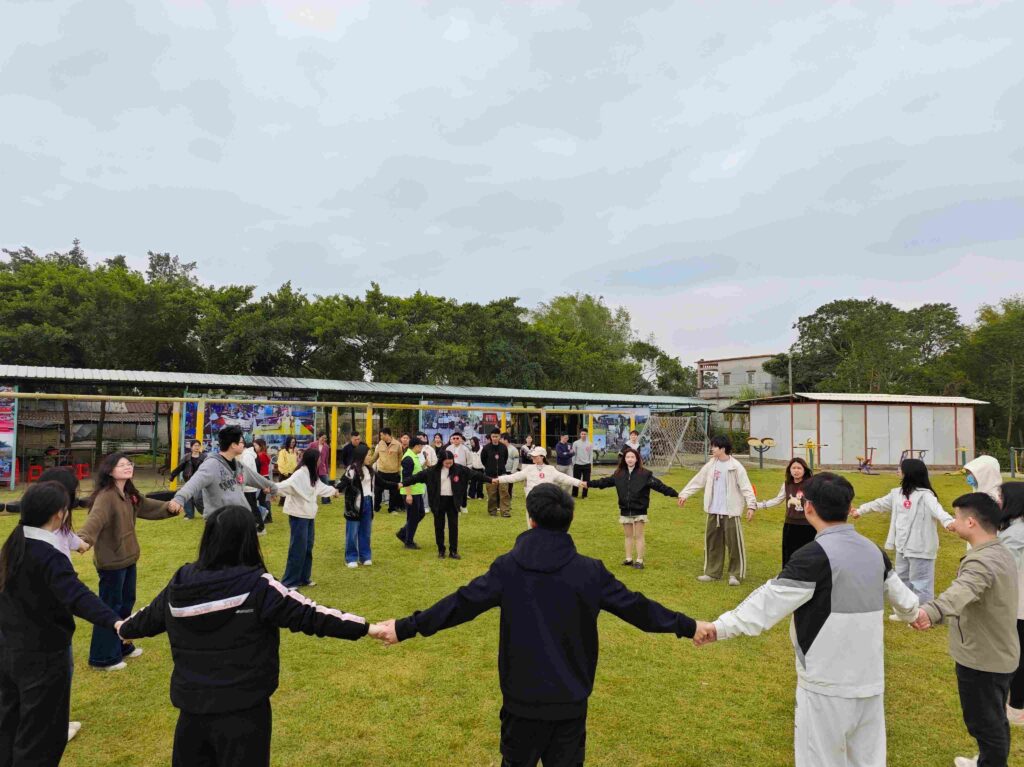 United We Stand Employees participating in outdoor team bonding activities.